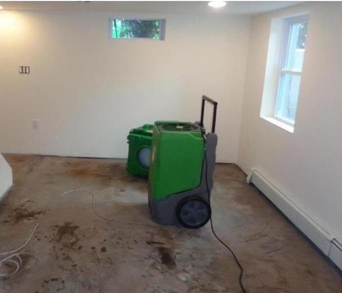 Room with concrete floor and equipment set-up